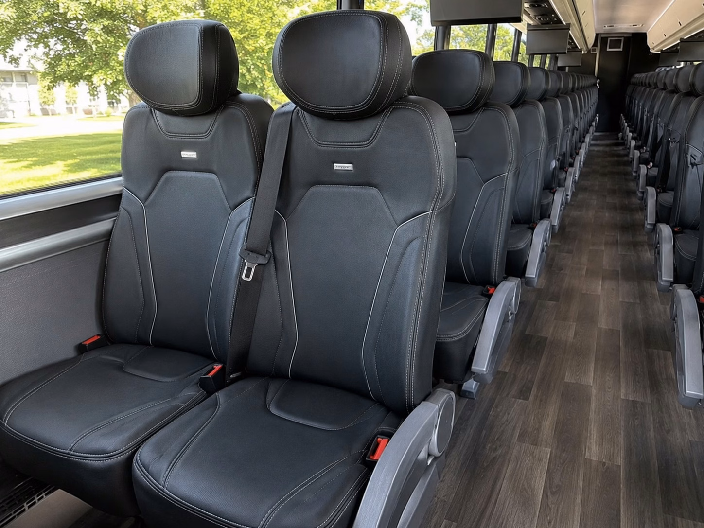 charter buses for bellevue ceremony to reception transfers